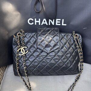 Authentic CHANEL 24k black quilted lambskin charm bag vintage circa 1989